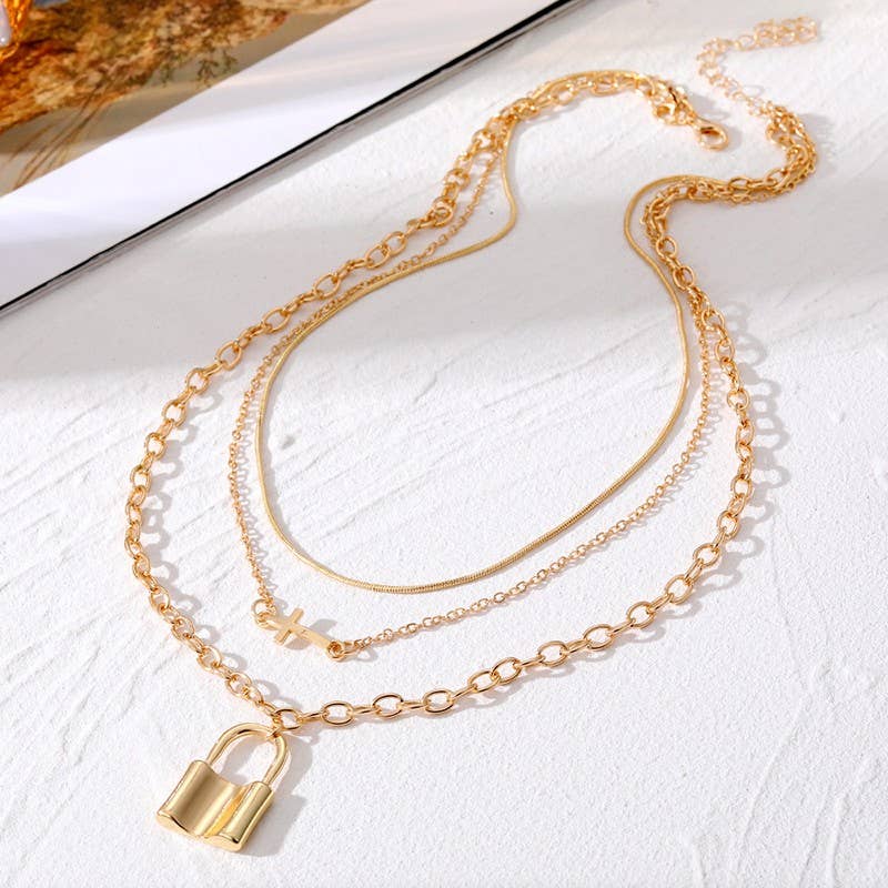 CROSS AND LOCK CHARM LAYERED NECKLACE  Gold